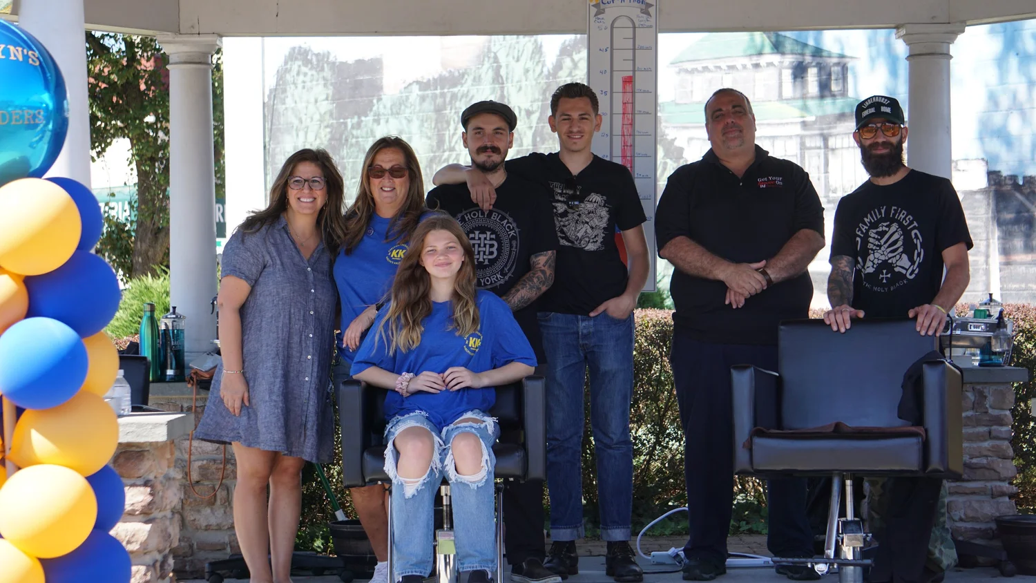 Kaelyn with Krusaders supporters at a Cut-A-Thon event